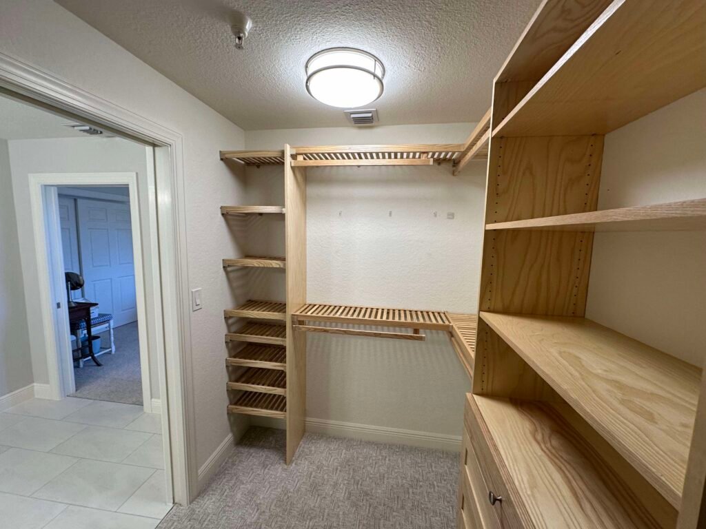 Custom solid wood walk-in closet in Southwest Florida by Sun Closets